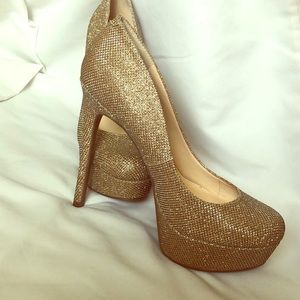 Gold stilettos.